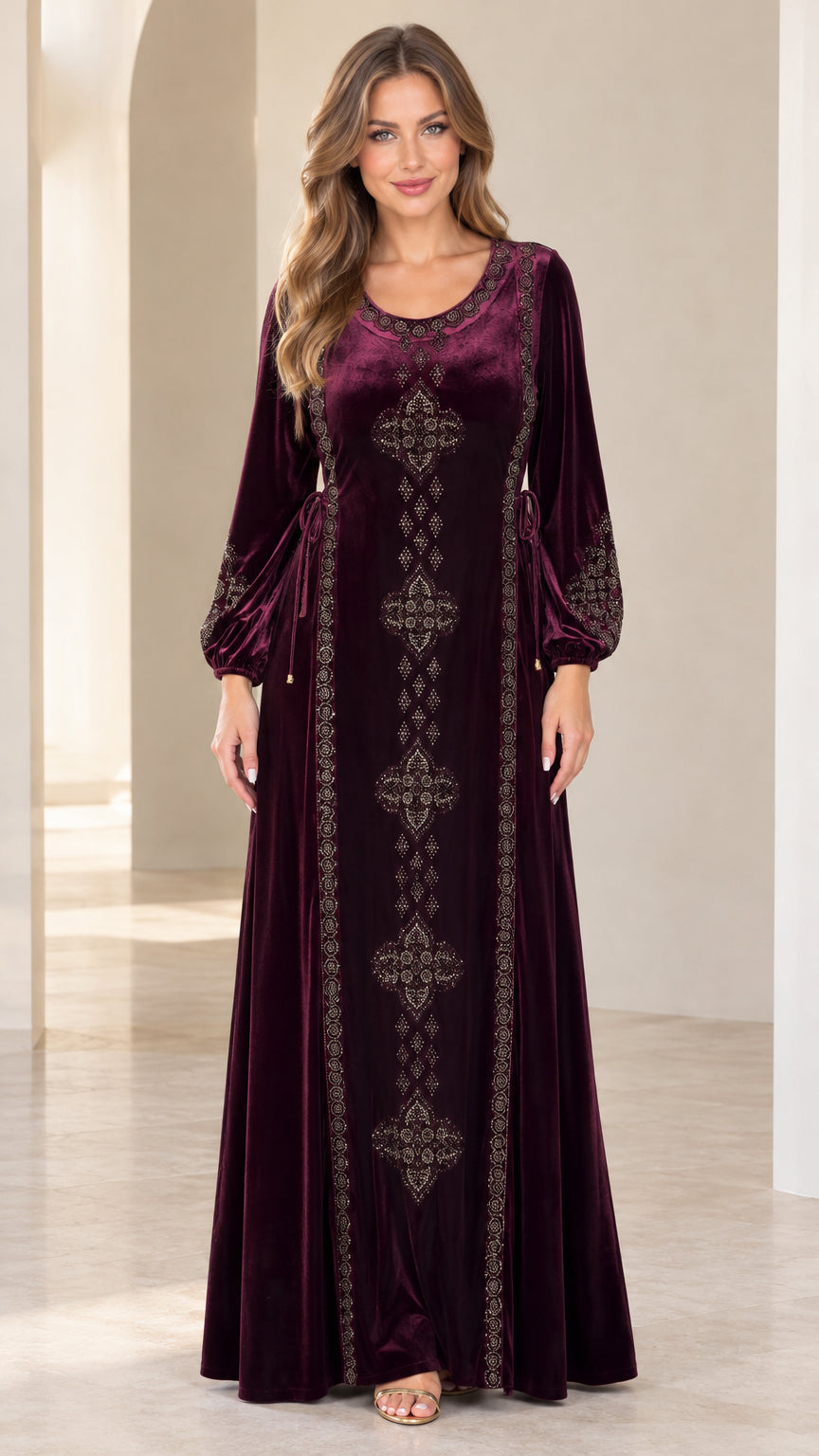 Front view of model wearing burgundy embroidered velvet maxi dress