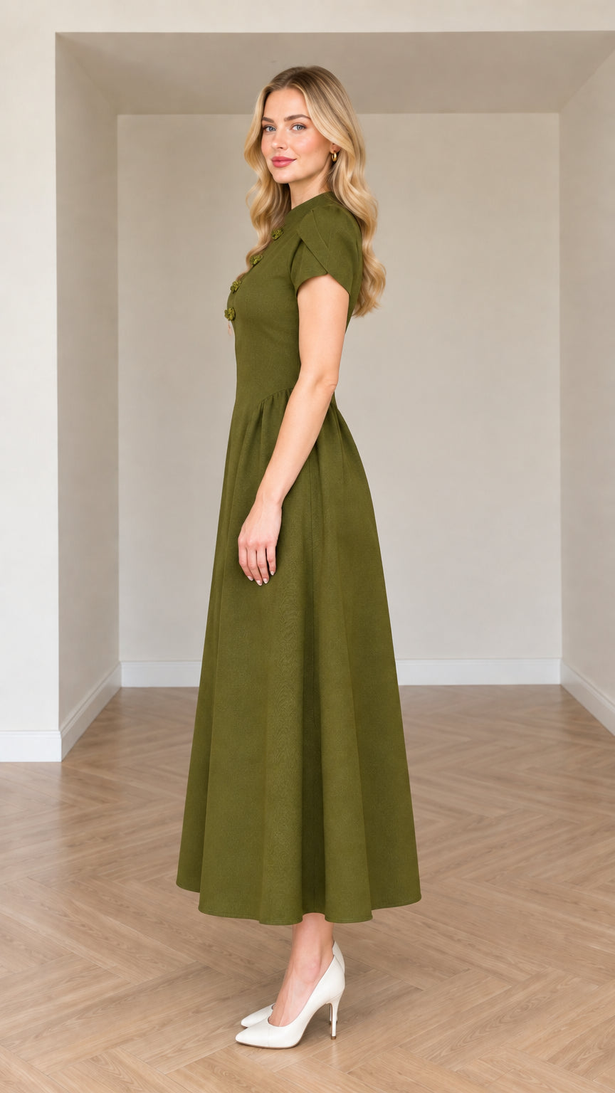 Side view of Olive Green A-line midi dress showing pleated skirt and fit