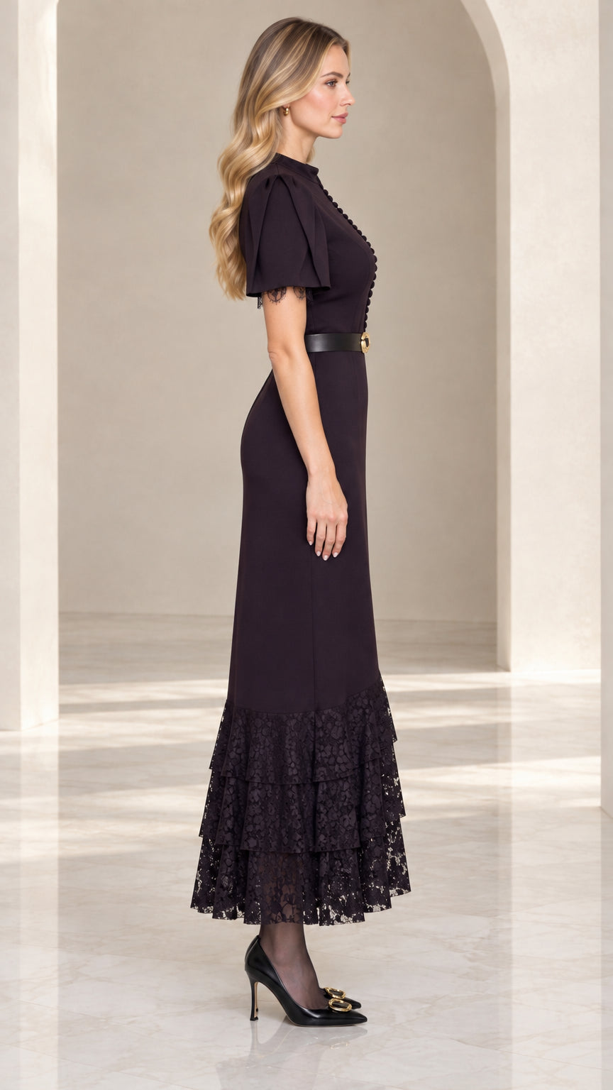Side profile view of black lace-trimmed flutter sleeve midi dress