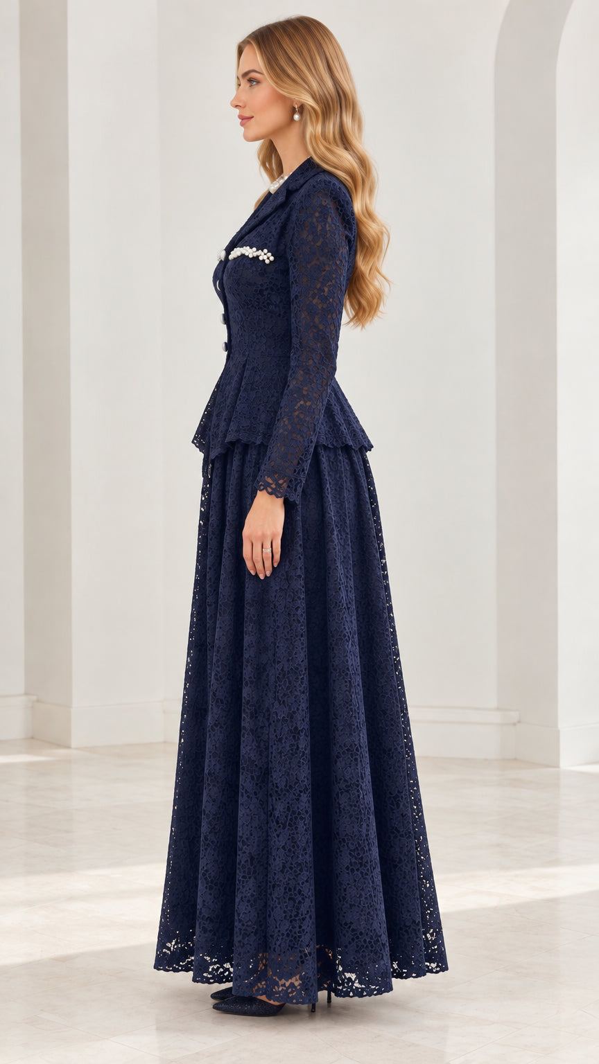 Side angle view of woman wearing navy blue long-sleeve lace maxi dress