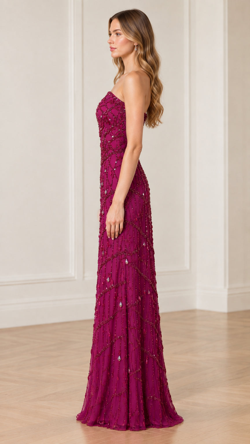 Strapless beaded column evening gown in magenta side profile view