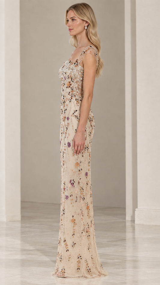 Side full-length view of Champagne floral embellished maxi dress