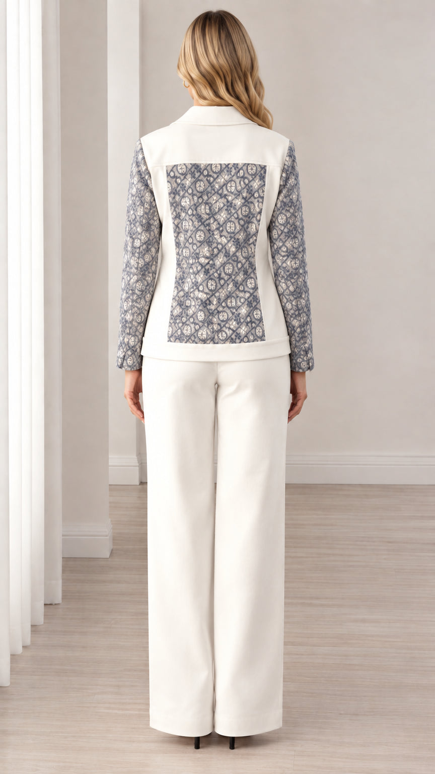 Back view of woman wearing Slate Blue jacquard panel blazer and white trousers