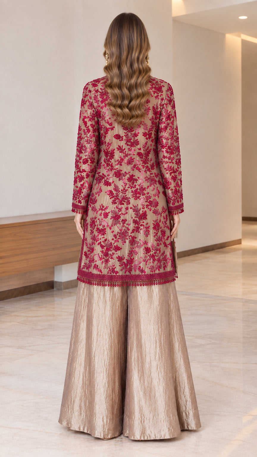 Back view of long embroidered tunic and wide-leg evening pants