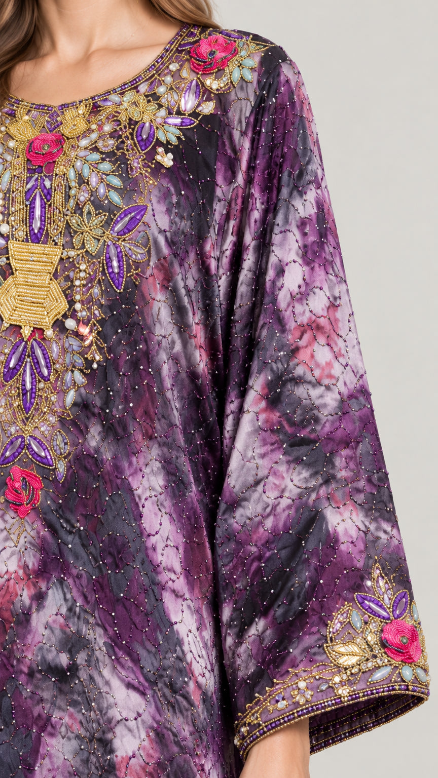 Close-up detail of crystal and beaded embroidery on neckline and cuff