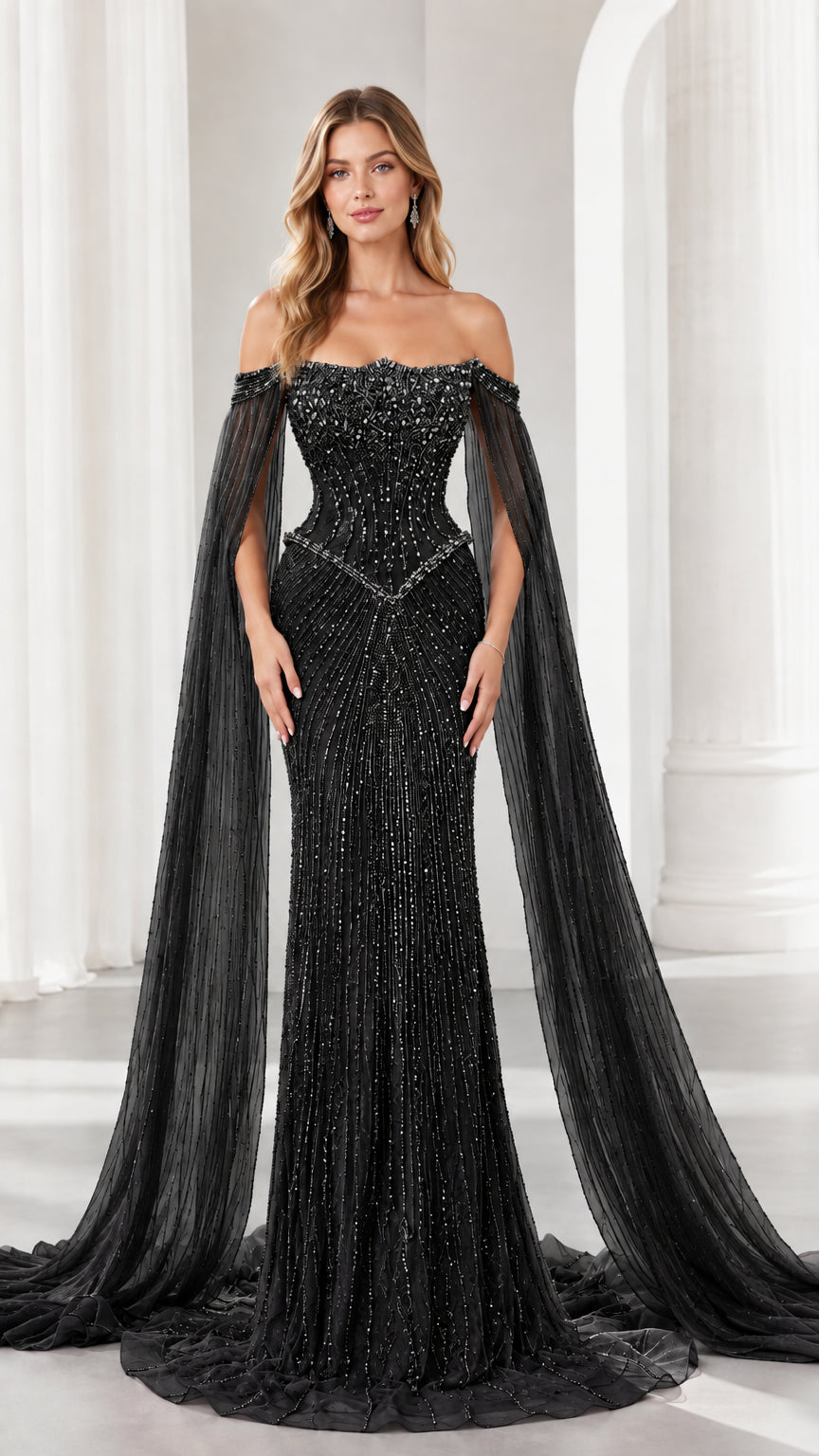Black off-the-shoulder beaded formal gown with long flowing cape sleeves