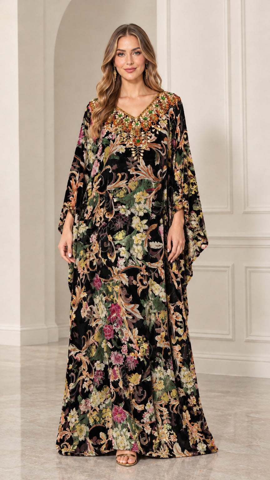Front view of woman wearing Black floral velvet embellished kaftan maxi dress