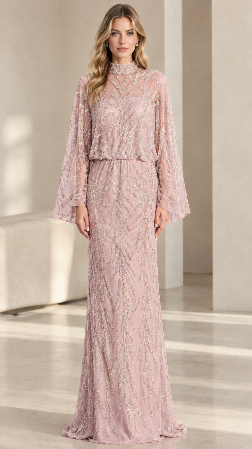 Front view of woman wearing blush pink beaded cape sleeve formal evening dress