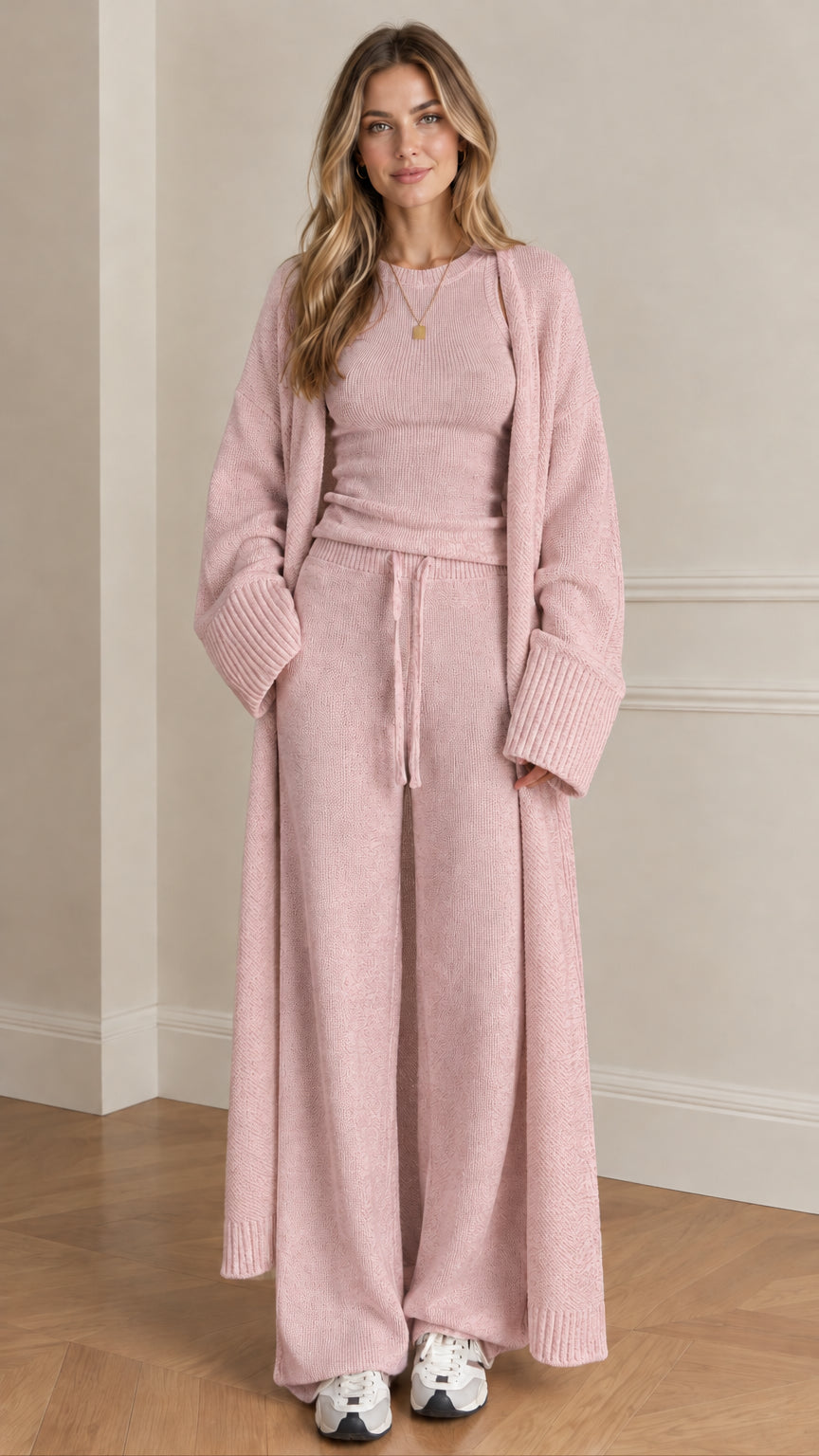 Front view of woman wearing dusty pink 3-piece knit lounge set with long duster
