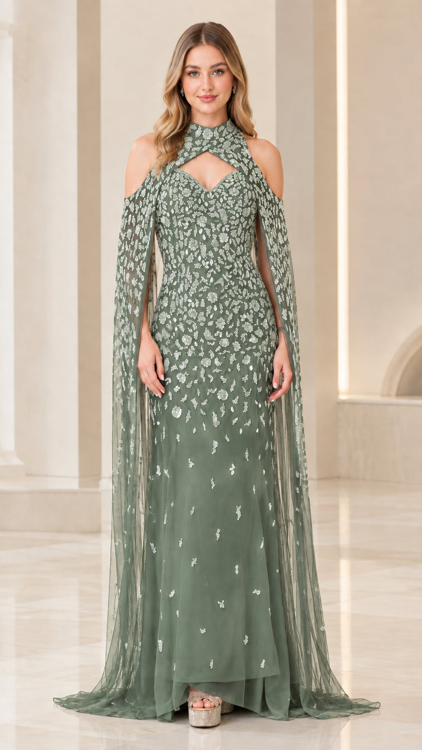 Full-length view of sage green embellished halter evening dress with cape