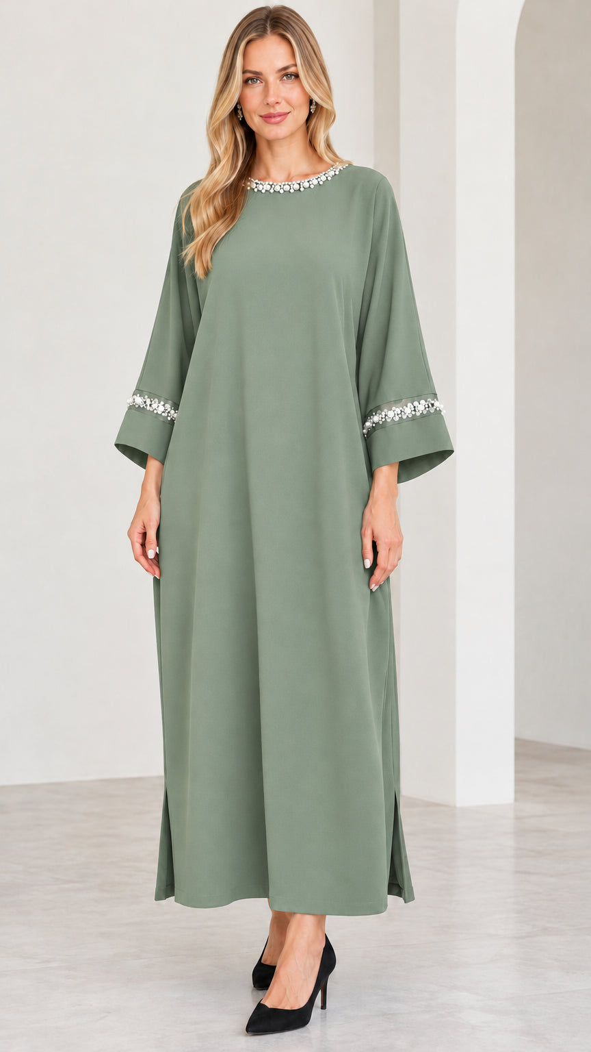 Full-length view of sage green modest long dress with pearl trim