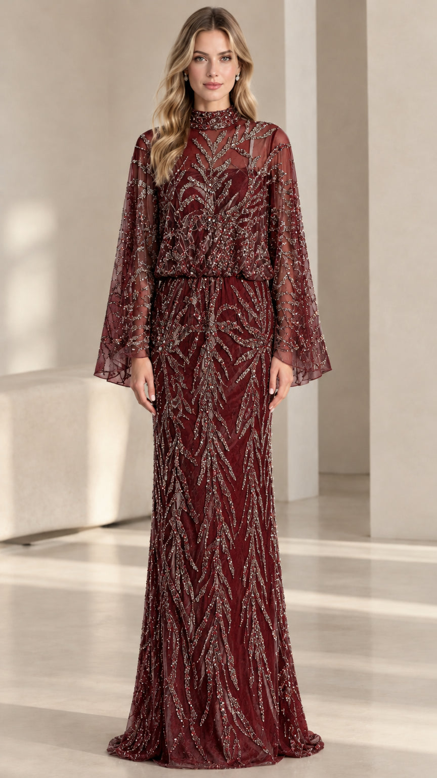 Front view of woman wearing burgundy red beaded cape sleeve evening gown