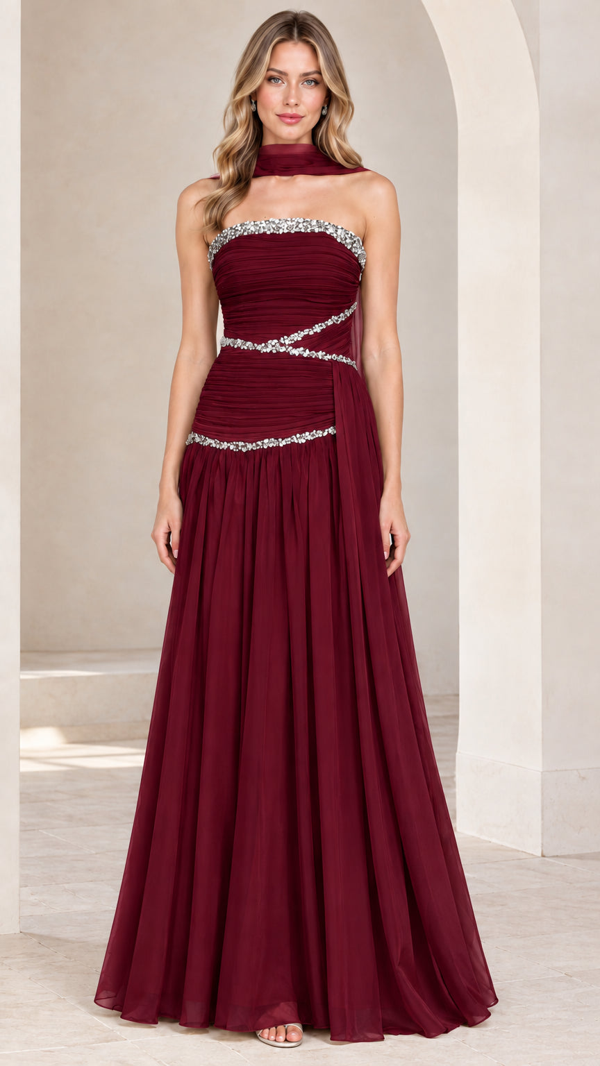 Front view of model wearing burgundy strapless rhinestone ruched chiffon evening gown