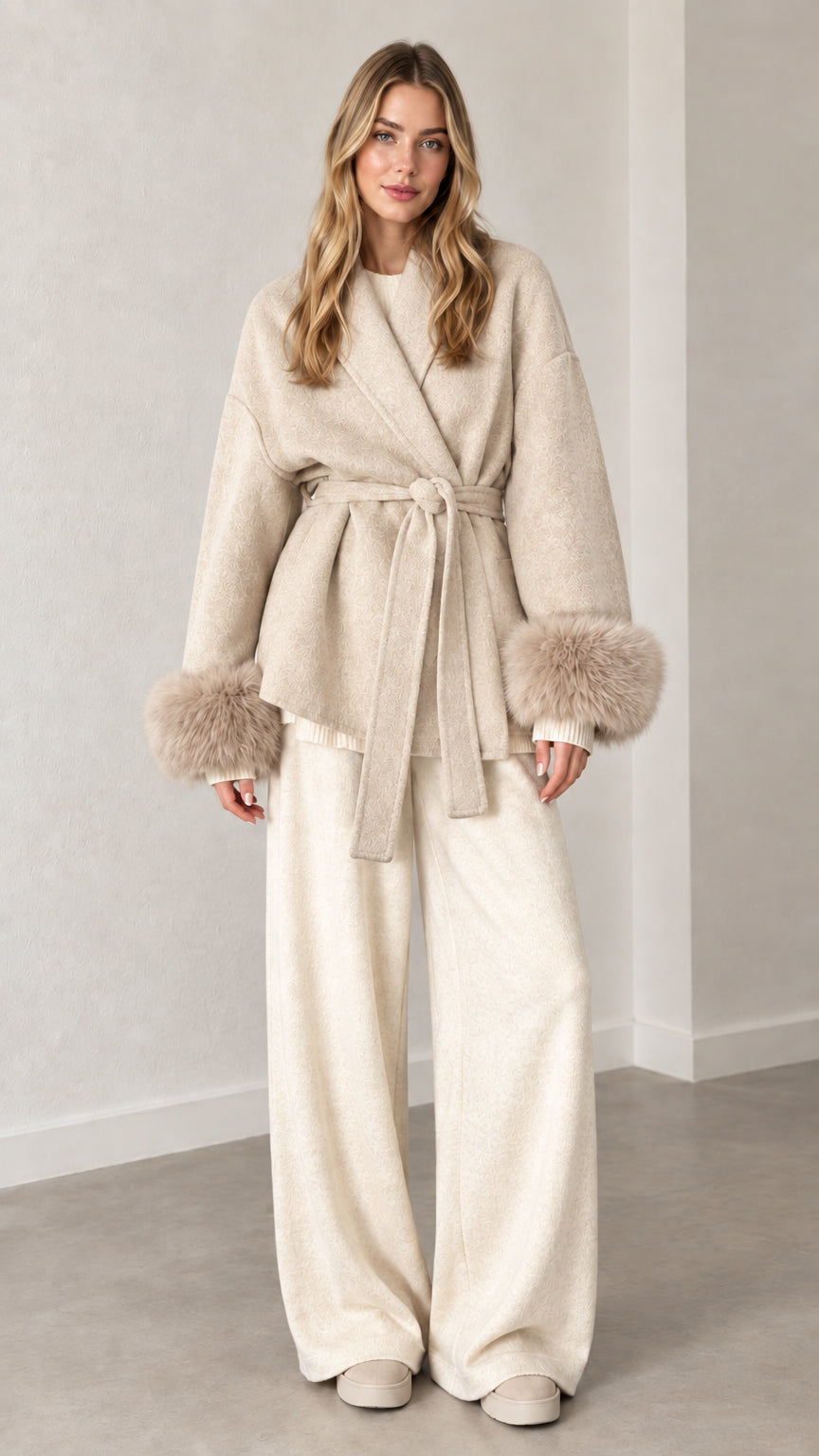 Front view of cream oatmeal belted short wrap coat with faux fur cuffs