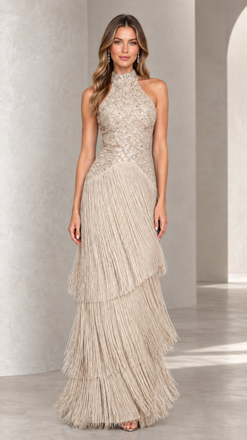 Front view of champagne gold halter beaded bodice tiered fringe maxi dress
