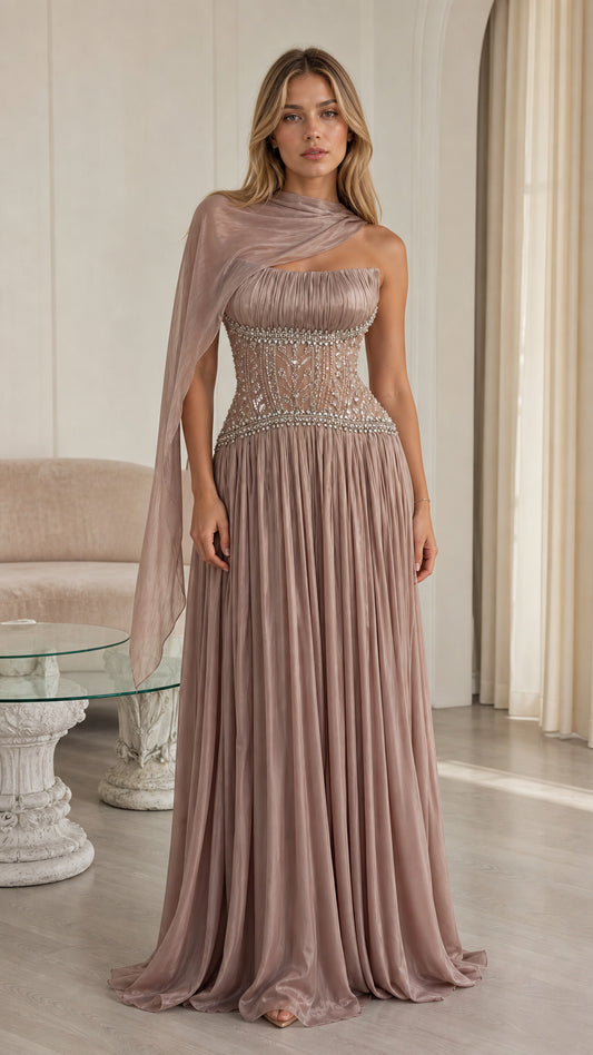 Front view of model wearing dusty mauve pleated chiffon evening gown with beaded corset and neck drape