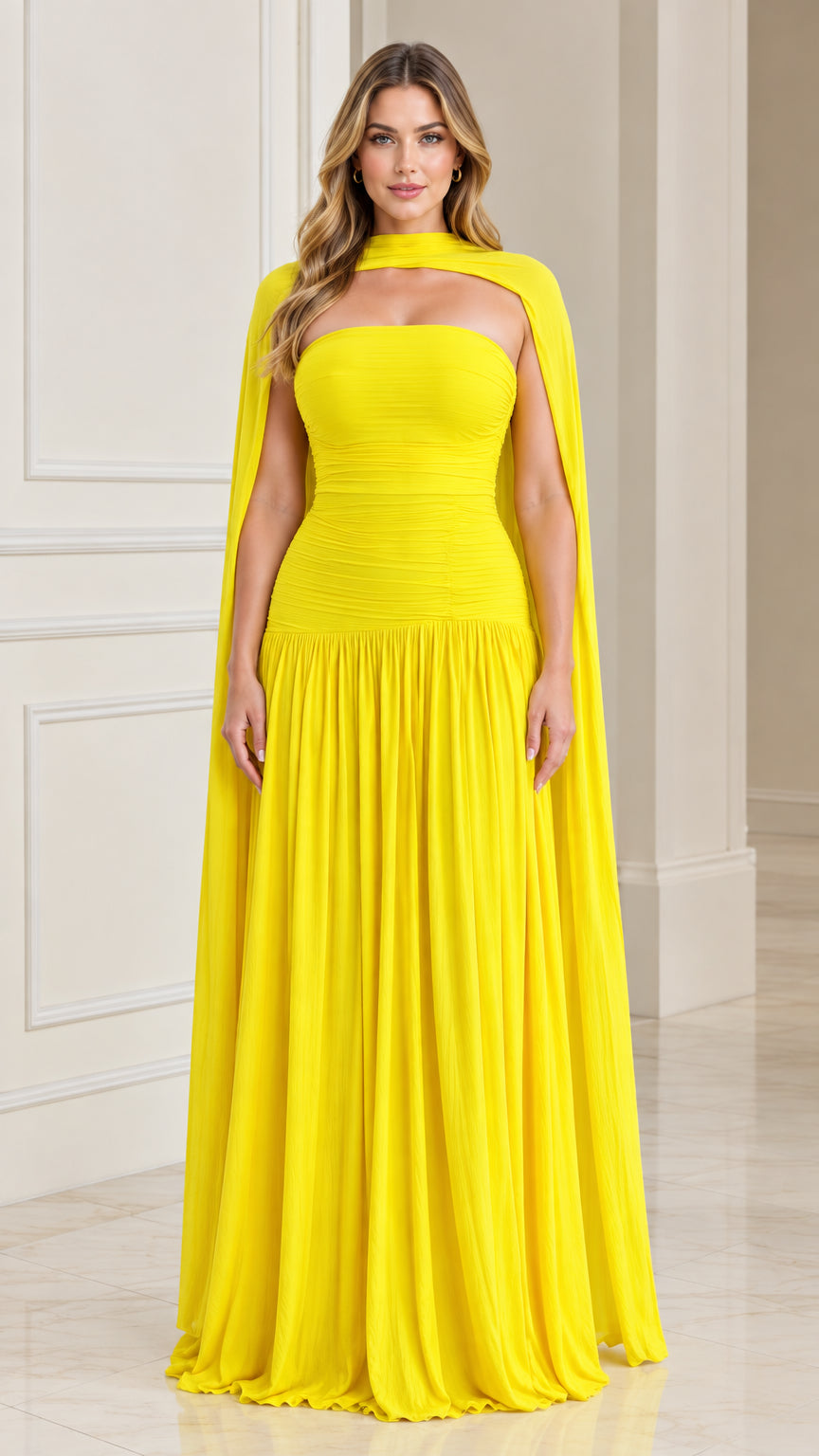 Yellow strapless ruched maxi gown with attached high neck shoulder cape front view