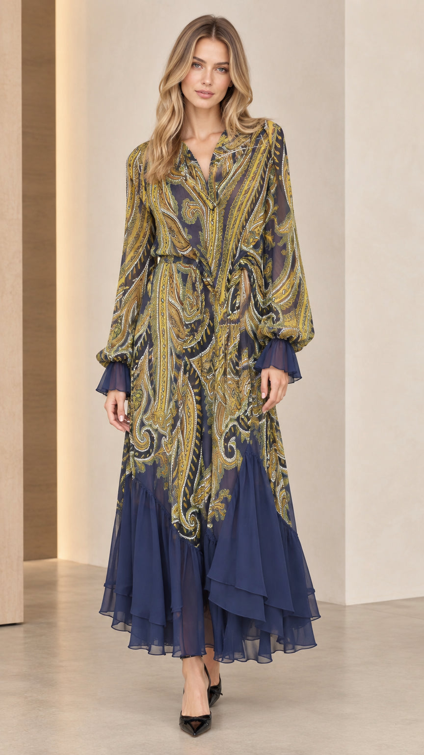 Front view of model wearing Navy Blue paisley print chiffon tiered maxi dress with belt