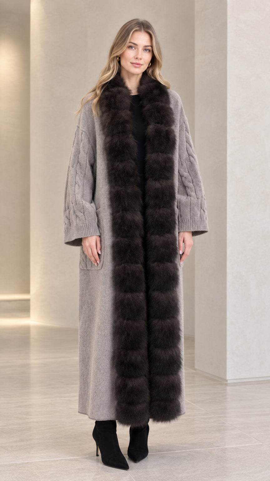 Front full view of woman wearing grey faux fur trim maxi cable knit cardigan coat