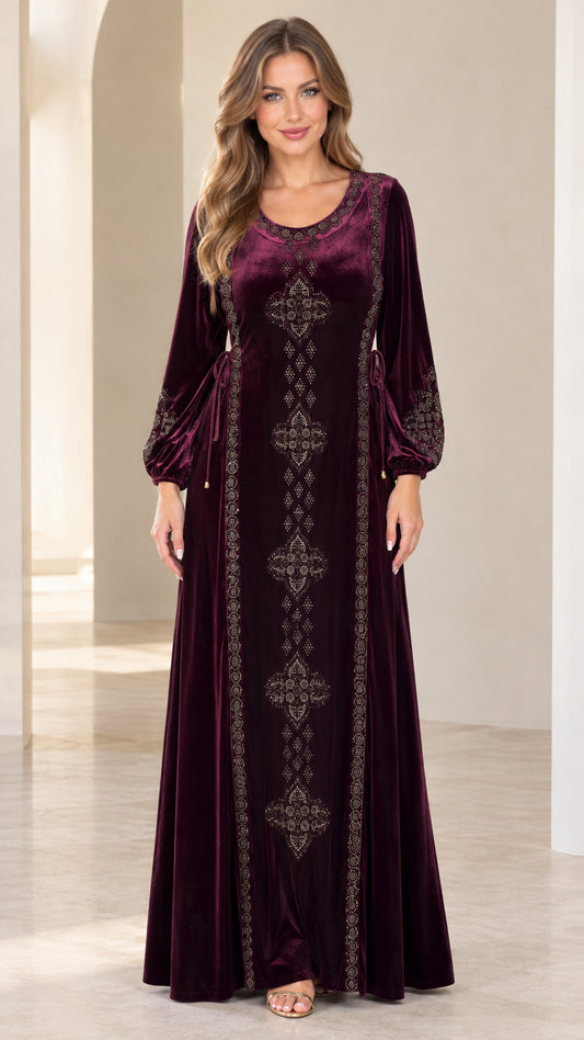 Front view of model wearing burgundy embroidered velvet maxi dress