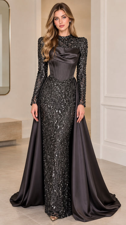 Front view of black sequin long sleeve evening gown with satin corset and sweeping train