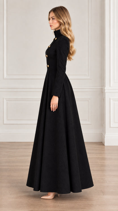 Side profile view of woman wearing black long flared military maxi coat