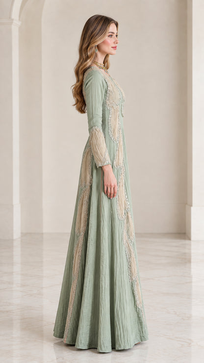 Side profile view of sage green textured A-line maxi dress