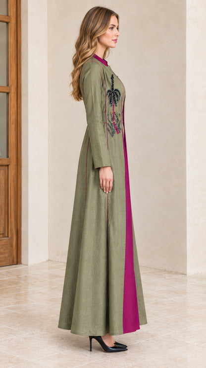 Side profile view of sage green embroidered maxi duster and inner dress set