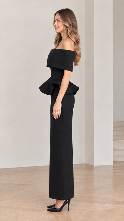 Side profile of woman in black off-the-shoulder column evening gown