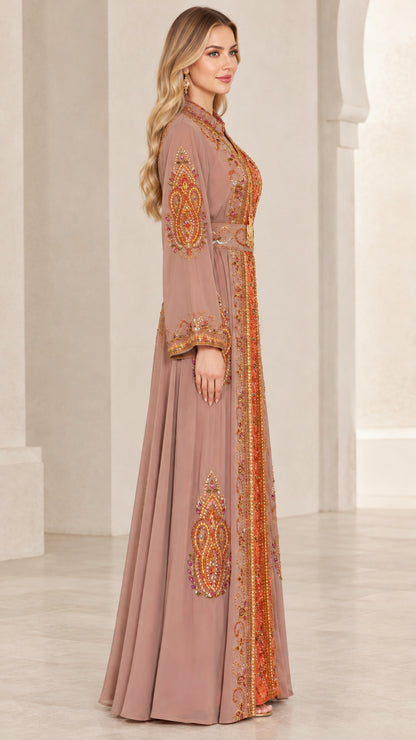 Side profile view of dusty rose long sleeve embroidered kaftan dress