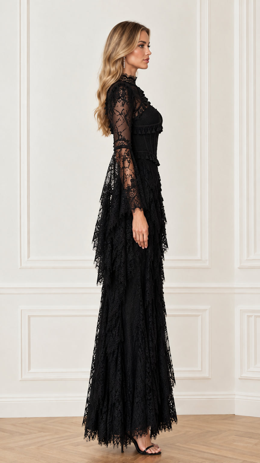 Side profile view showing the slim fit and dramatic sleeve drape of the black lace gown
