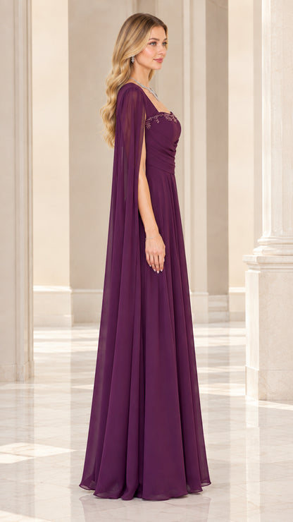 Side profile view of plum floor-length chiffon dress showing graceful cape drape