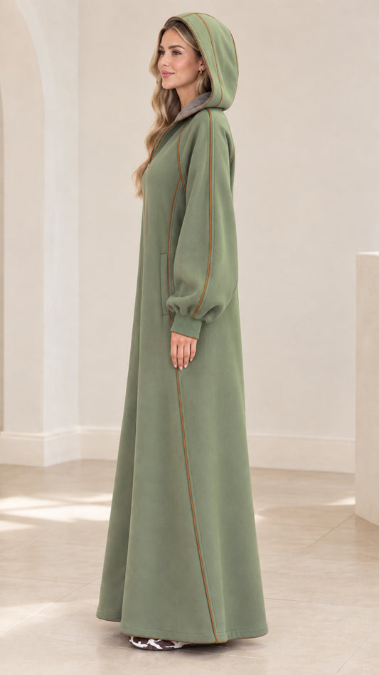 Side view of sage green hooded maxi robe coat with contrast piping