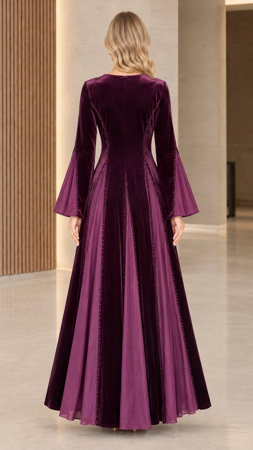 Plum velvet maxi dress back view showing sweeping hem and panel construction