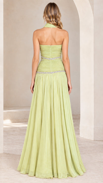 Back full-length view of light green strapless drop-waist evening gown