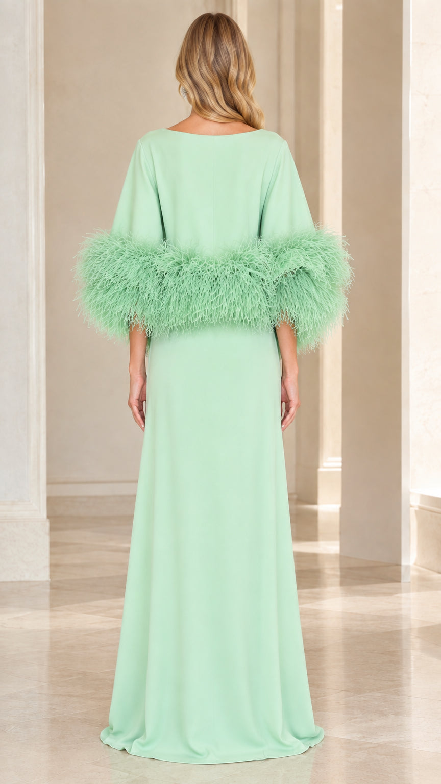 Back view of model wearing mint green boat neck evening gown with invisible zipper