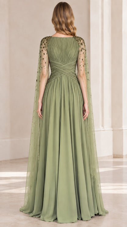 Back view of sage green floor-length evening gown with draped cape
