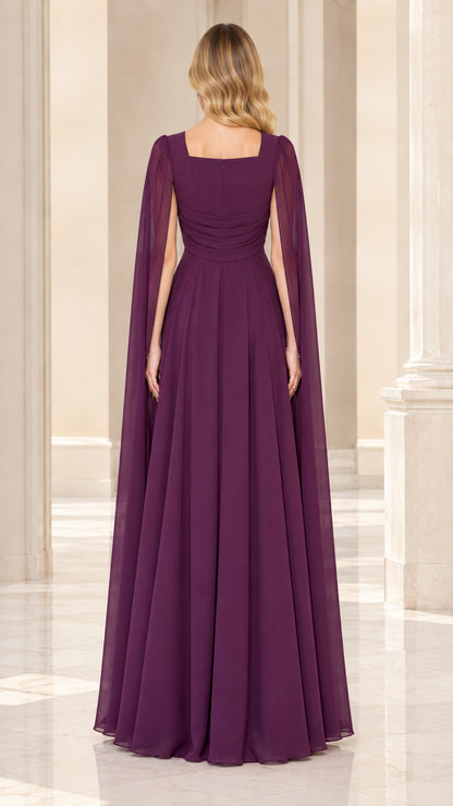 Back view of plum evening gown showing square back and long flowing cape sleeves