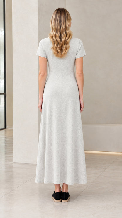 Back full-length view of woman wearing Heather Grey maxi dress showing clean A-line silhouette