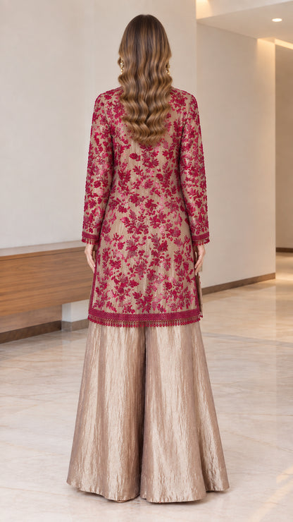 Back view of long embroidered tunic and wide-leg evening pants