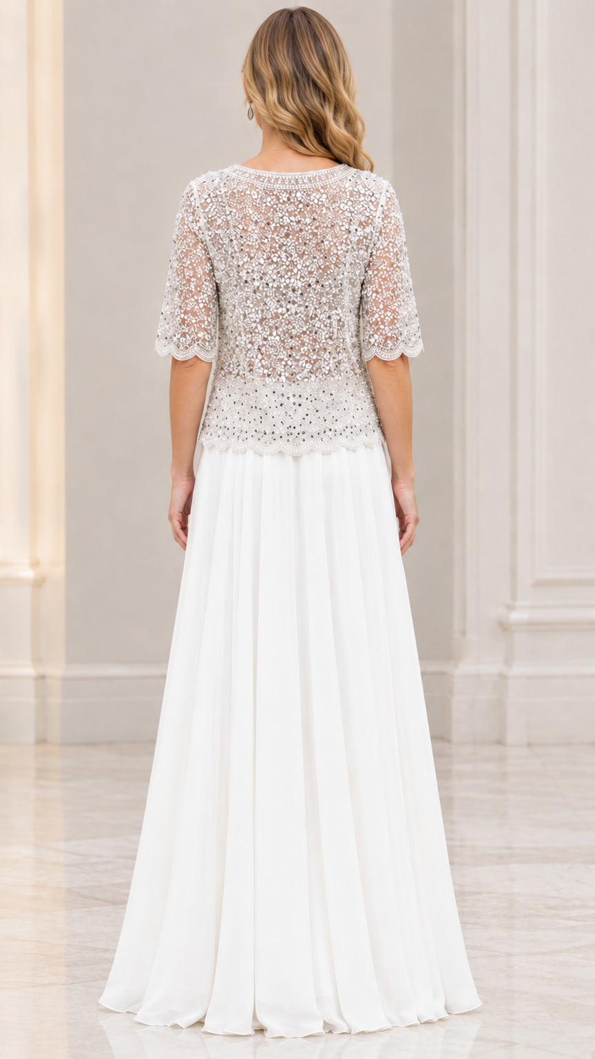 Back view of Ivory beaded top maxi evening gown showing elegant drape