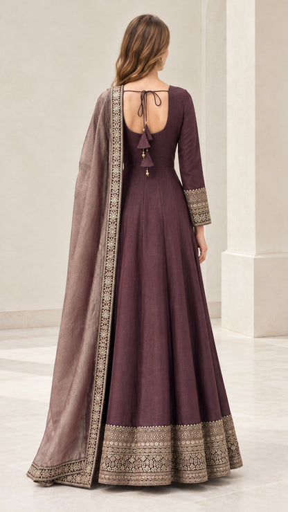 Plum ethnic maxi gown back view featuring tie closure and tassel details