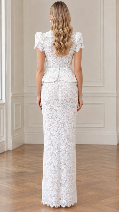 Back view of woman wearing white lace peplum maxi gown