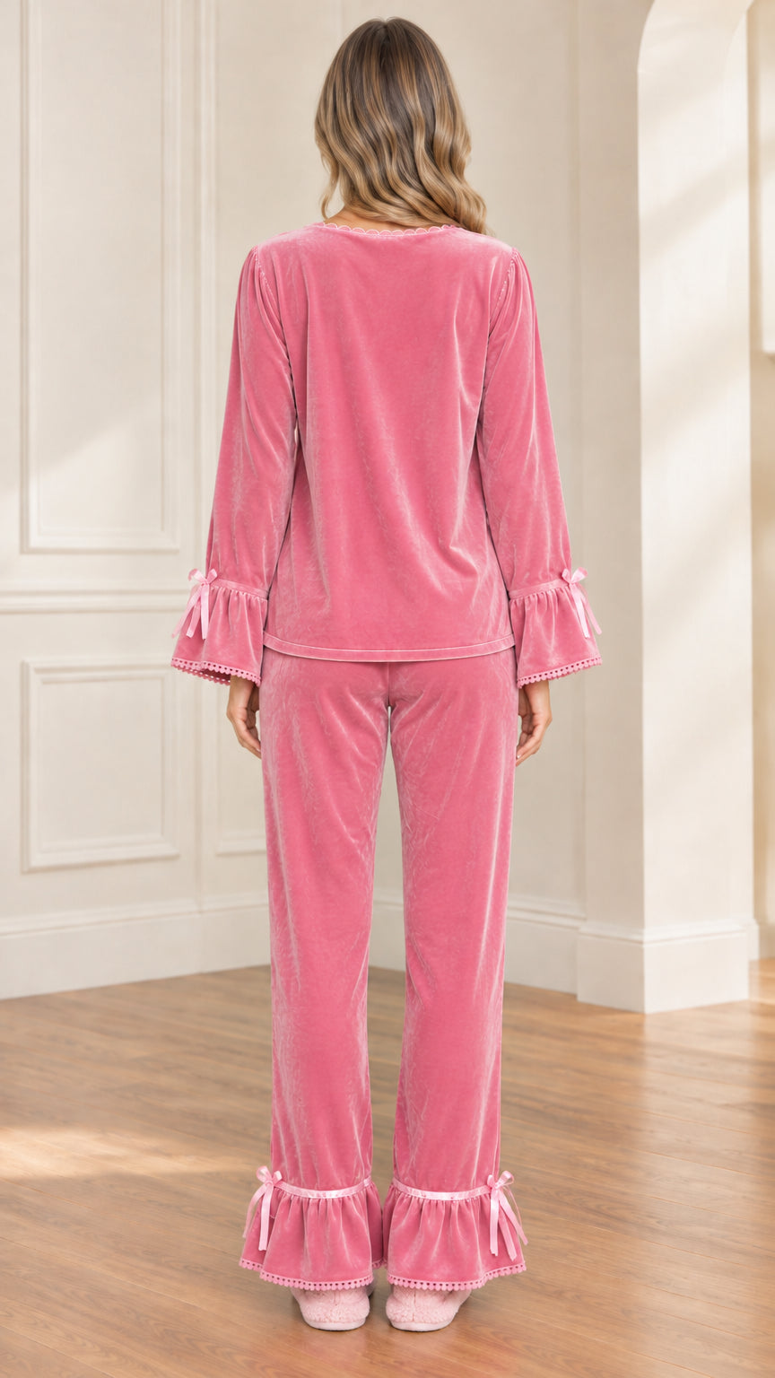 Back view of women's pink long-sleeve velvet pajama set