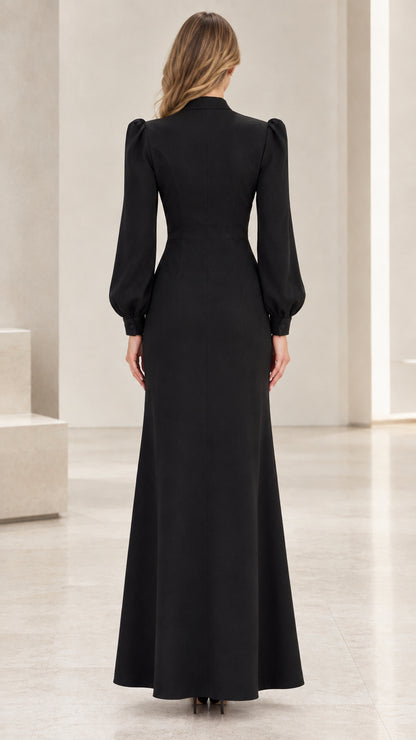 Back view of black long sleeve formal maxi dress