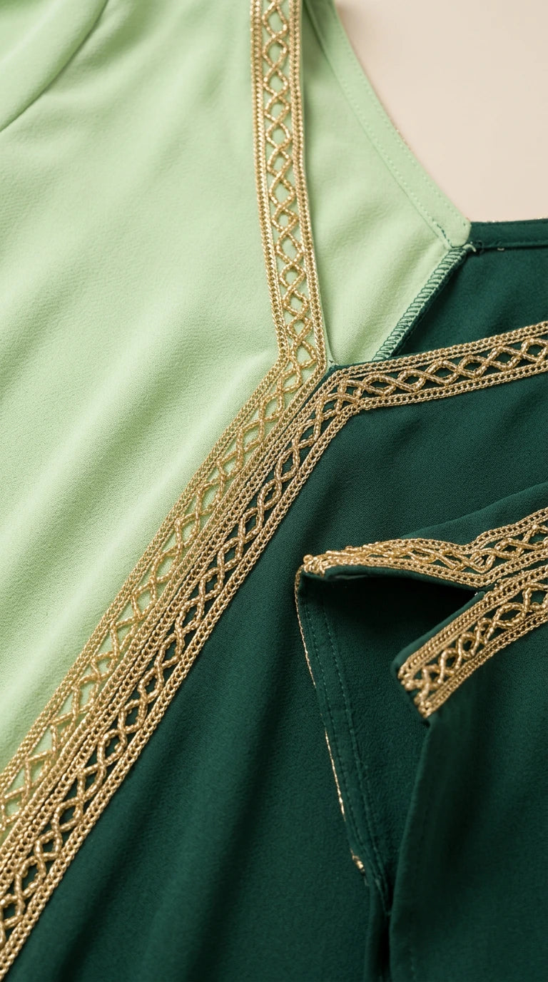 Close-up detail of metallic gold braided embroidered trim and woven fabric