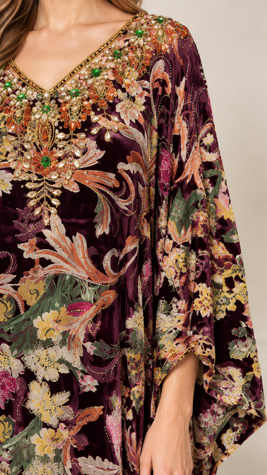 Close-up detail of embellished jewel neckline on Plum floral velvet kaftan