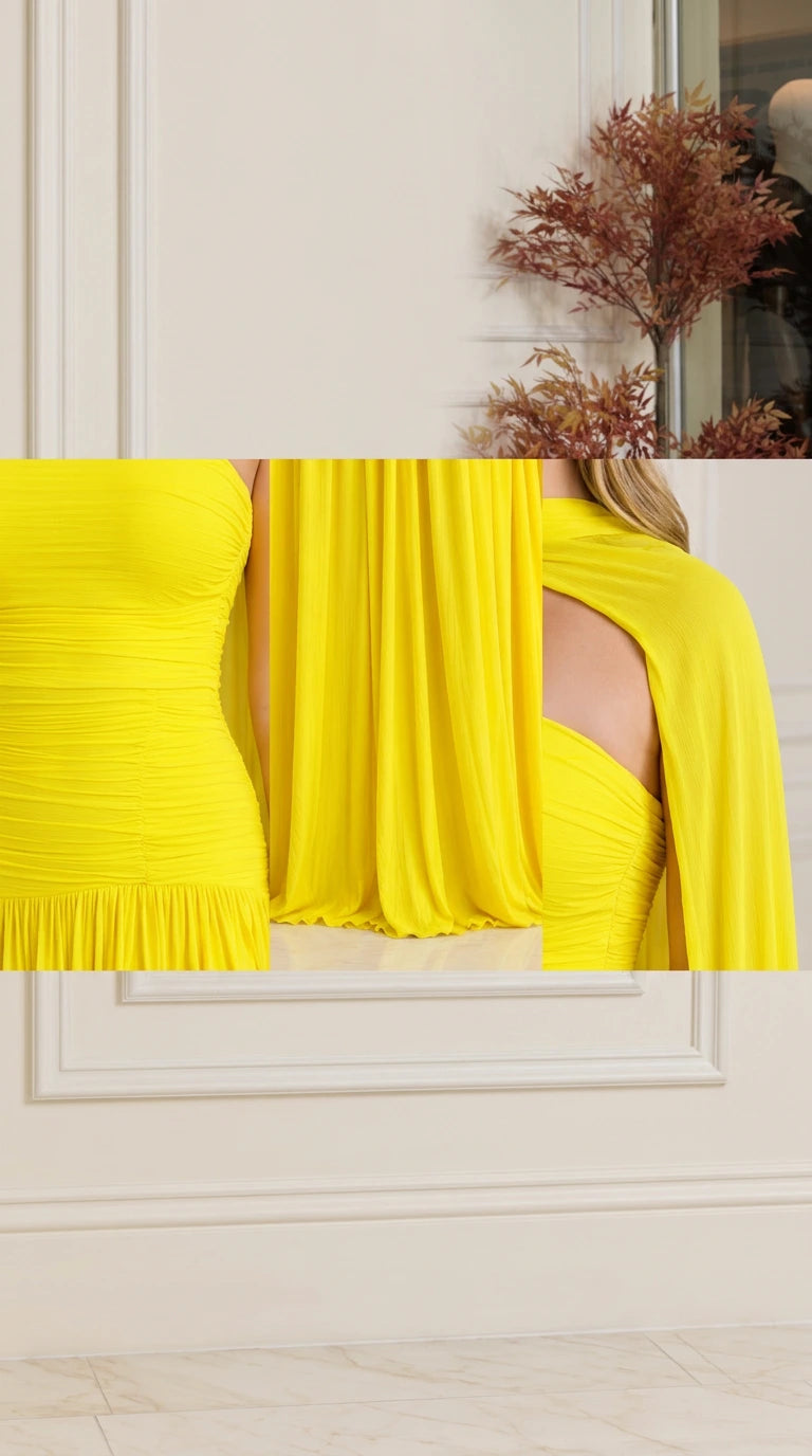 Close-up detail of fine bodice ruching and flowing cape fabric on yellow gown