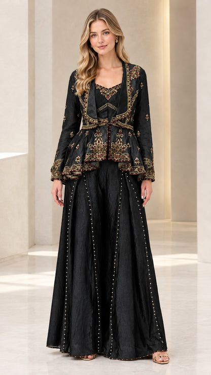 Front full-length view of woman wearing black embroidered peplum pant set
