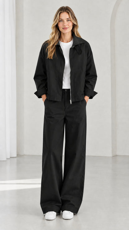 Full front view of women's black utility zip jacket and wide-leg pants set